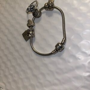 Pandora Silver Charm Bracelet with Intricate Design and Snake Chain